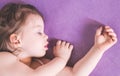 Little cute baby sleeping soundly in her bed Royalty Free Stock Photo