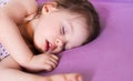 Little cute baby sleeping soundly in her bed Royalty Free Stock Photo