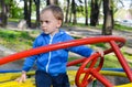 Little cute blond angry boy Royalty Free Stock Photo