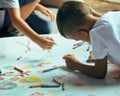 Little cute boy with company painting on birthday Royalty Free Stock Photo