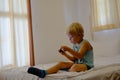 Boy playing video games on portable device Royalty Free Stock Photo