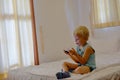 Boy playing video games on portable device Royalty Free Stock Photo