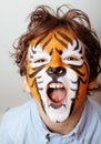 Little cute boy with faceart on birthday party Royalty Free Stock Photo