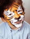 Little cute boy with faceart on birthday party Royalty Free Stock Photo