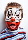 Little cute boy with facepaint like clown, pantomimic expression