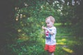 Boy playing in forest Royalty Free Stock Photo
