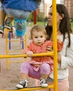 Little cute boy and girl playing outside, adorable friendship, baby todler with carying mother, lifestyle people concept Royalty Free Stock Photo