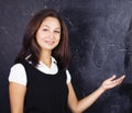 Little cute boy in glasses with young real teacher, classroom studying at blackboard school kido Royalty Free Stock Photo