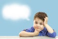 Little cute boy and his cloud of thoughts on isolated background Royalty Free Stock Photo