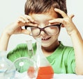 little cute boy with medicine glass isolated wearing glasses smi Royalty Free Stock Photo