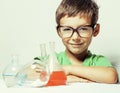 Little cute boy with medicine glass isolated Royalty Free Stock Photo