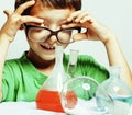 little cute boy with medicine glass isolated wearing glasses smi Royalty Free Stock Photo