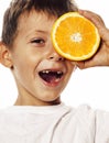 Little cute boy with orange fruit double isolated on white smiling without front teeth adorable kid cheerful Royalty Free Stock Photo