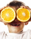 Little cute boy with orange fruit double isolated on white smiling without front teeth adorable kid cheerful Royalty Free Stock Photo