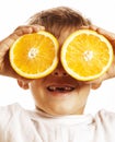 little cute boy with orange fruit double isolated on white smiling without front teeth adorable kid cheerful Royalty Free Stock Photo