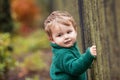 Little cute boy in the park. Close up picture of Lovelyl ittle boy in the autumn garden. Outdoor activities for children Royalty Free Stock Photo