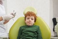 Little cute boy sitting in chair at dentist Royalty Free Stock Photo