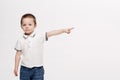 Little boy pointing by finger up and looking at stars.