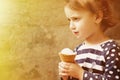 Little cute child girl eating ice cream food, dessert, childhoo Royalty Free Stock Photo