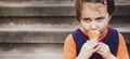 Little cute child girl eating ice cream. Food, dessert, childhood, satisfaction, carelessness concept Royalty Free Stock Photo