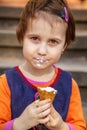 Little cute child girl eating ice cream. Food, dessert, happy childhood, carelessness concept Royalty Free Stock Photo