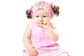 Little cute child girl in pink dress isolated on white background. Royalty Free Stock Photo