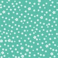 Little Cute Flowers on Green Checkered Background.