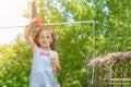 Little cute girl blowing soap bubbles is smiling Royalty Free Stock Photo