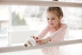 Little cute girl in class in ballet studio Royalty Free Stock Photo