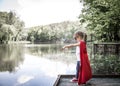 Little cute girl in costume of a super hero