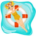 Little cute girl floating on an inflatable circle in the pool