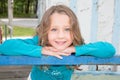 Little cute girl having fun at the park child showing front teeth with big smile Royalty Free Stock Photo