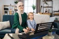 Little cute girl with music muslim teacher having lesson at piano at school of music. Royalty Free Stock Photo