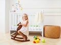 Little cute girl in nursery room Royalty Free Stock Photo