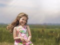 Little cute girl outdoors smiling happy in the sunlight Royalty Free Stock Photo