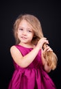 Little cute girl in a pink dress Royalty Free Stock Photo