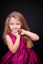 Little cute girl in a pink dress Royalty Free Stock Photo