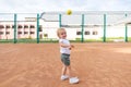 Little cute girl playing at tennis court Royalty Free Stock Photo