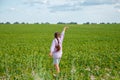 Little cute girl running across the soybean field, summer Royalty Free Stock Photo