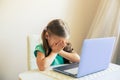 Little cute girl using laptop to have video call Royalty Free Stock Photo