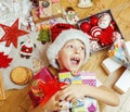 Little cute kid in santas red hat with handmade Royalty Free Stock Photo