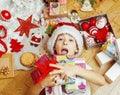 Little cute kid in santas red hat with handmade Royalty Free Stock Photo