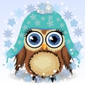 A little cute owl in a blue cap with long ears, a winter owl, shelter from the cold