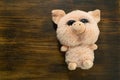 Little cute pig on wooden background. Closeup cute soft toy pig. Symbol of Chinese New Year. Children`s Pig Toy Royalty Free Stock Photo