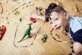 Little cute preschooler boy playing lego toys at home, lifestyle children concept Royalty Free Stock Photo