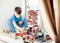 Little cute preschooler boy playing lego toys at home, lifestyle children concept Royalty Free Stock Photo