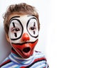 little cute real boy with facepaint like clown, pantomimic expre