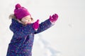 Little cute toddler girl outdoors on a sunny winter day Royalty Free Stock Photo