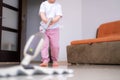 little daughter cleaning in the house, child dusting, Cute little helper girl washing floor with mop, happy family Royalty Free Stock Photo