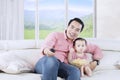 Little daughter and father watching tv Royalty Free Stock Photo